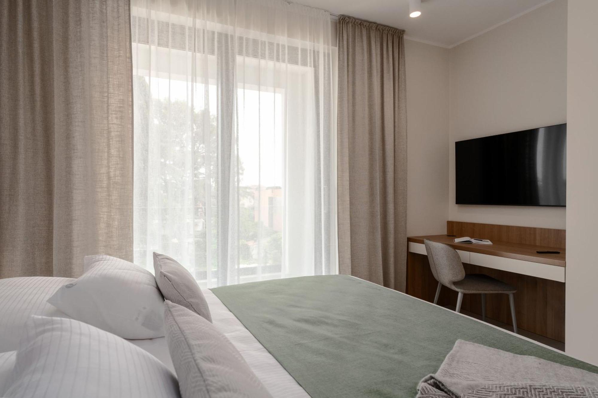 The Q Bliss - Your New 4-Star Hideaway With A Garage ロヴィニ エクステリア 写真